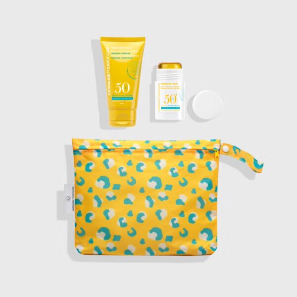 Germaine de Capuccini Timexpert Sun SPF 50 promoset met anti-aging beschermingsvloeistof en onzichtbare zonbeschermingsstick, aanwezig in een gele waterbestendige toilettas met turquoise luipaardprint.